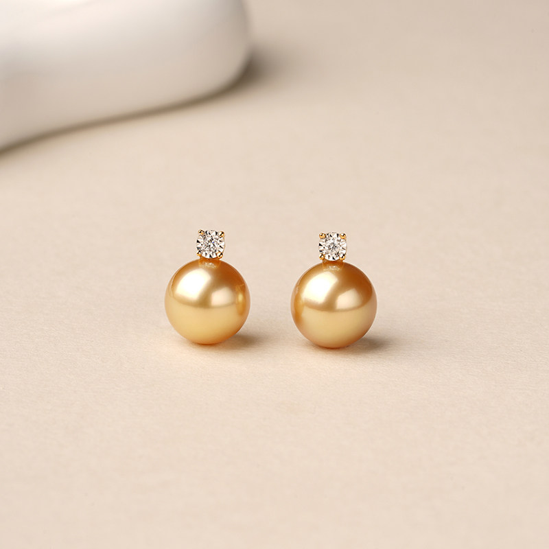 ohrstecker aus Sudsee Perlenmit diamanten und 18k gelbgold